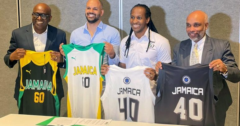 JaBA President Paulton Gordon, technical director of Stella Azzurra Basketball Academy and Jamaica minister of state for sport Alando Terrelonge peruse the document at the MOU signing at Jamaica Pegasus hotel in New Kingston on Thursday., January 12, 2023